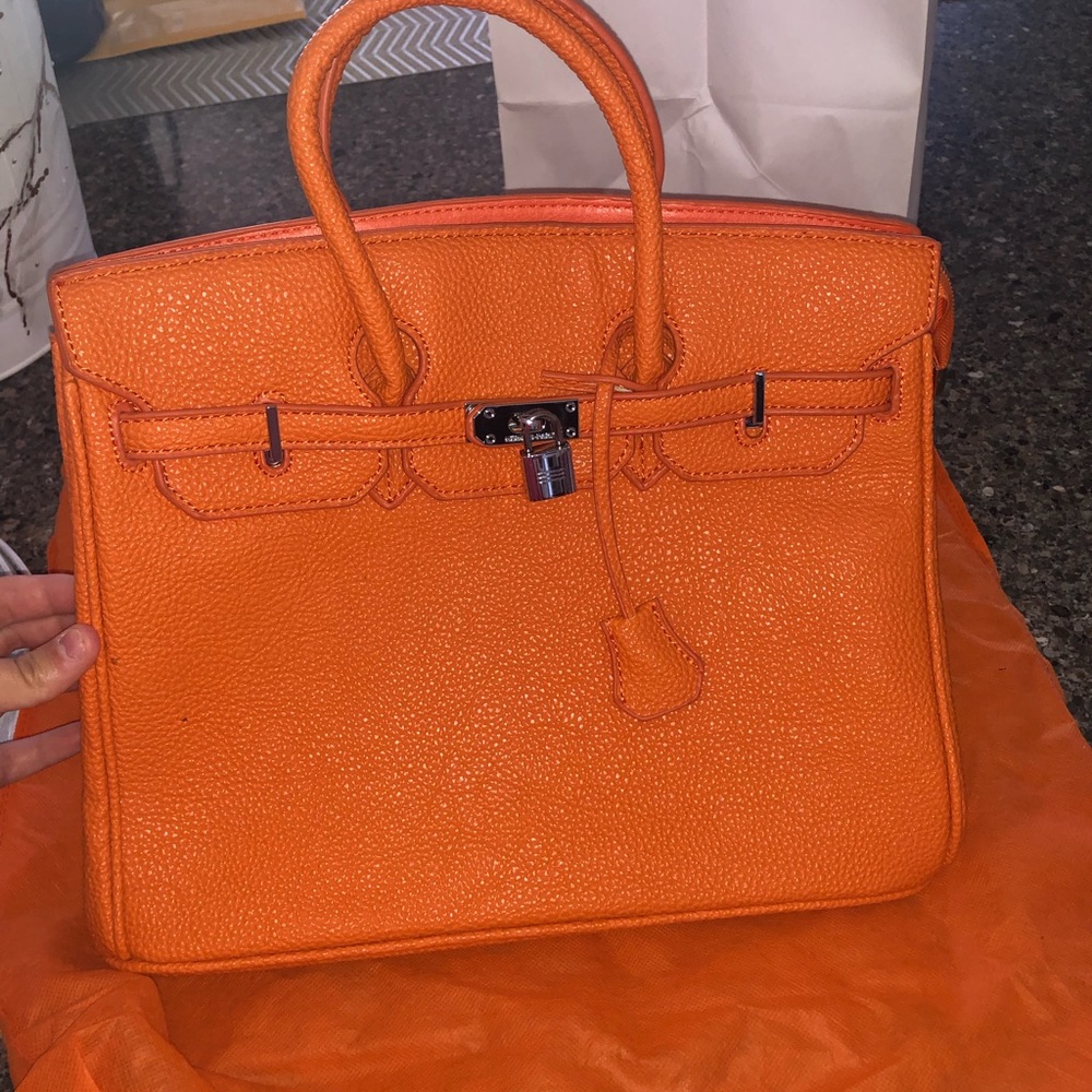Orange hand bag